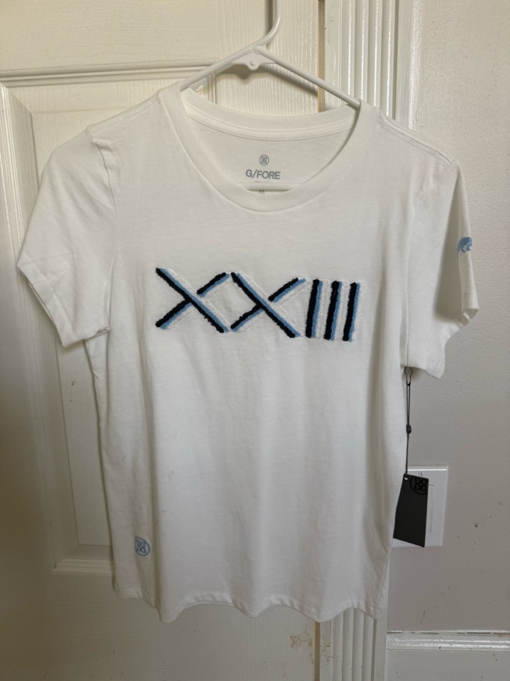 G/FORE Sno White Tee with Branded Hang Tag